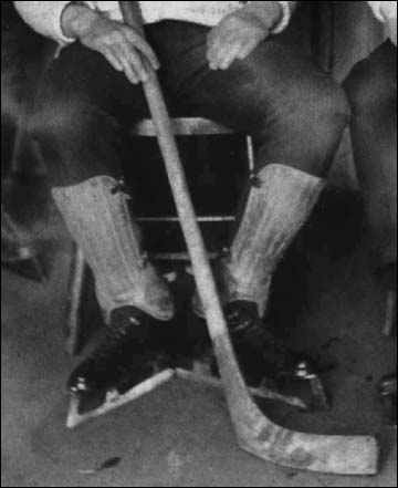 Short Shin Pads and a Round Handle Stick 1890 