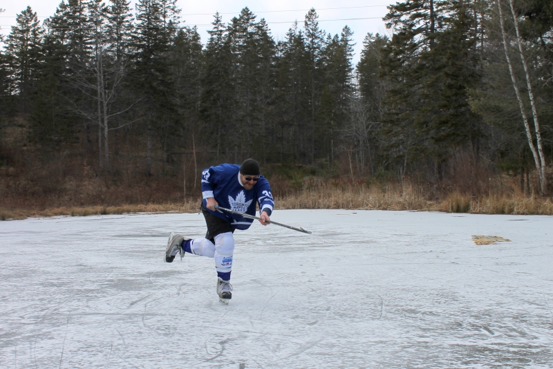 Al Iafrate winds up for a slapshot on Long Pond in Windsor, Nova Scotia.